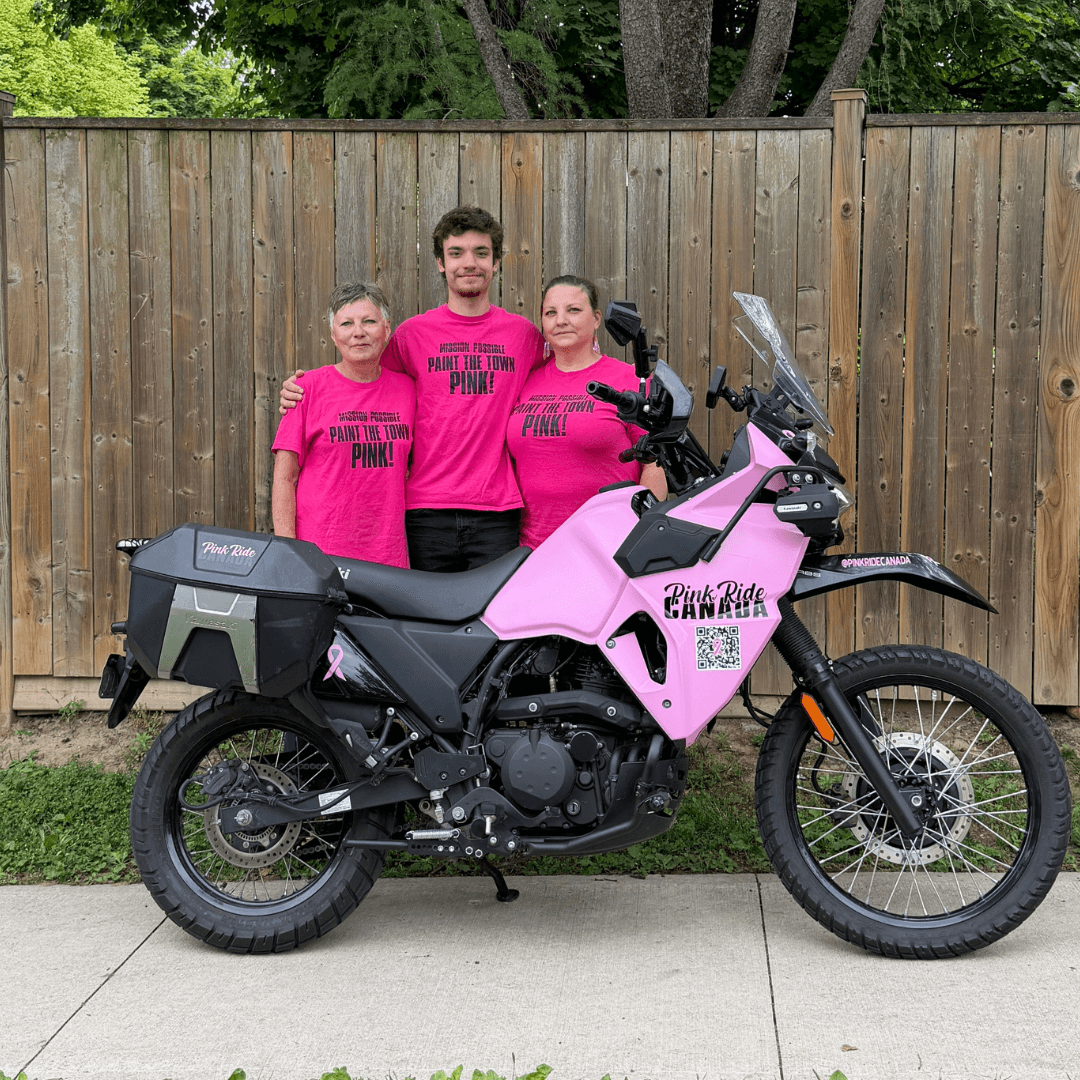 Laurie (left), Quinton (centre), Brandi (right) with the pink KLR650